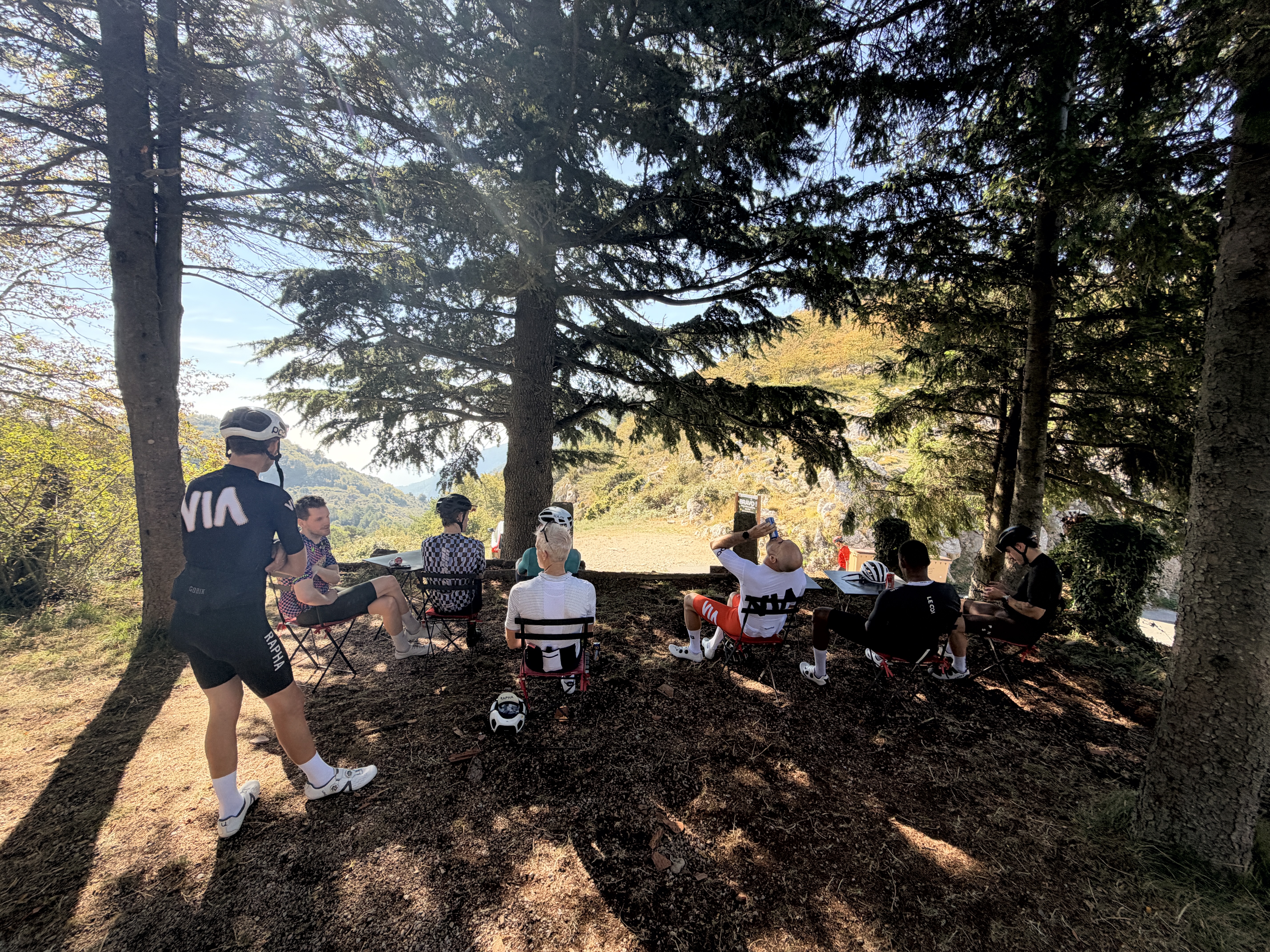 Grabbing a drink at the top of Col de la Madone